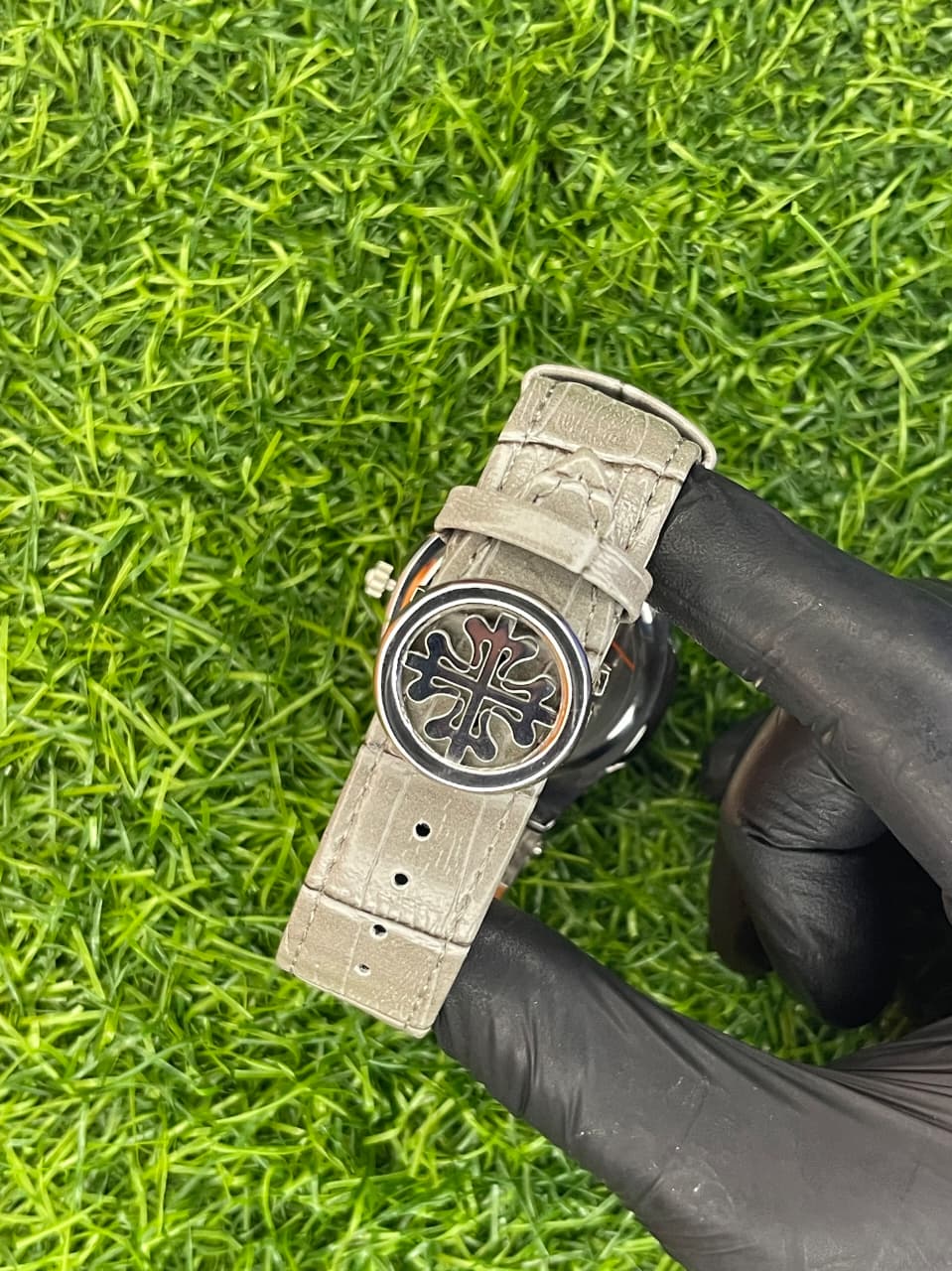 Patek Philippe style silver dial watch with stainless steel bracelet at Aziz Store Pakistan
