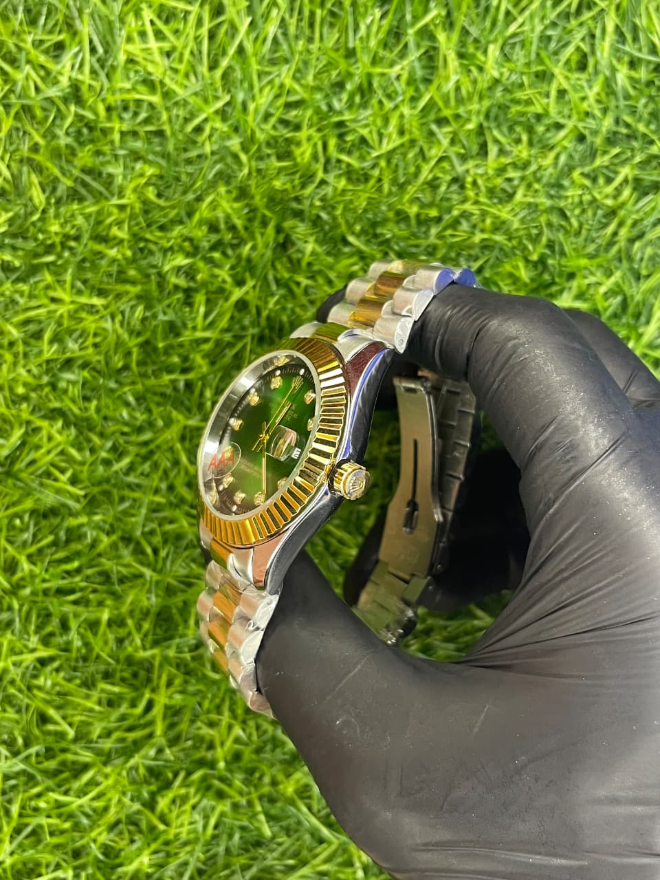 Rolex Datejust style green dial two-tone steel watch with fluted bezel at Aziz Store Pakistan